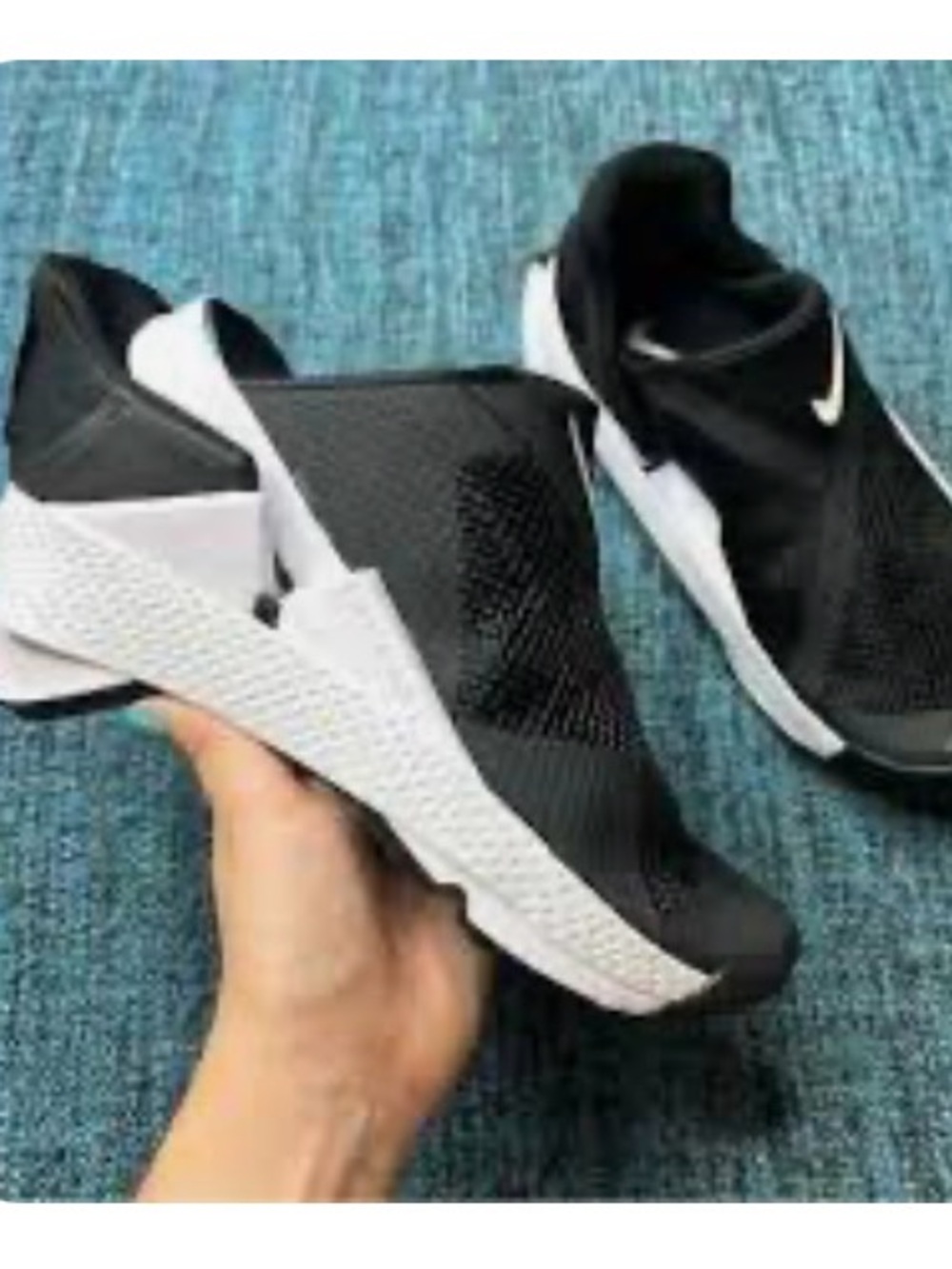 Nike Women’s Black and White Slip-On Mesh Sneakers